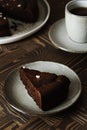 Moist Ginger Chocolate cake sprinkled with sea salt, cup of tea Royalty Free Stock Photo