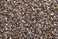 Moist loose chippings, crushed stone, road and plaster grit, surface, from above Royalty Free Stock Photo