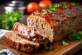 Moist and tender meatloaf made with a blend of ground beef and pork, garnished with sliced tomatoes and fresh parsley