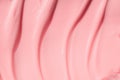 Moisturizing beauty creme, balm swatch, pink paint, yogurt texture. Peach cream, moisturizer, shampoo spread, sunscreen Royalty Free Stock Photo