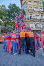 Moixiganga group forming human tower on the street festival in Valencia