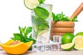 Mojito cocktail with fresh lime, mint leaves and ice cubes in a transparent glass Royalty Free Stock Photo