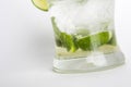 Mojito cocktail lime juice with soda and water served in a glass decorated with sliced lime and mint leaves Royalty Free Stock Photo