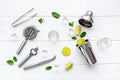 Mojito cocktail set with bar tools and utensils with lime and mint, flat lay Royalty Free Stock Photo