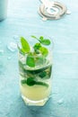 Mojito cocktail. Summer cold drink with lime, fresh mint, and ice. Cool beverage Royalty Free Stock Photo