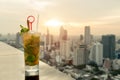 Mojito cocktail on table in rooftop bar with Bangkok city Royalty Free Stock Photo