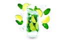 Mojito coctail with fresh flying mint leaves, ices and lime sli