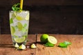 Mojito , lime pieces , leaves of mint with ice Royalty Free Stock Photo