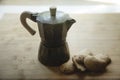 Moka pot of coffee with biscuits for a delicious breakfast Royalty Free Stock Photo