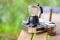 Moka pot on the portable gas stove Royalty Free Stock Photo