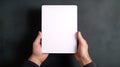 Mokap hands with a tablet in a vertical orientation for demonstrating content or interface