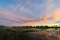 Mokoro in the Okavango delta at sunset, Botswana Royalty Free Stock Photo