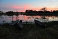 Mokoro in the Okavango delta at sunset, Botswana Royalty Free Stock Photo