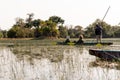 Mokoro ride in the okawango delta in Botswana in africa Royalty Free Stock Photo