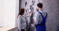 Mold Damage On House Wall. Woman Looking Royalty Free Stock Photo