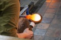 Molding molten glass