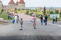 Moldova, Bender - May 18, 2019: A boy and a girl ride scooters in the park