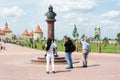 Moldova, Bender - May 18, 2019: Tourists are photographed against the background of the monument to Alexander Nevsky. Moldova,