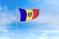 Moldova flag over blue sky background