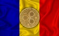 Moldova flag, ripple gold coin on flag background. The concept of blockchain, bitcoin, currency decentralization in the country.