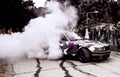 Moldova 25.09.2019. Sport modern Stance Car racing car drifting with smoke drift burnout, big colourful green blue clouds with