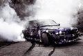 Moldova 25.09.2019. Sport modern Stance E30 BMW Car racing car drifting with smoke drift burnout, big clouds with Royalty Free Stock Photo