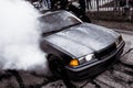 Moldova 25.09.2019. Sport modern Stance E36 BMW Car racing car drifting with smoke drift burnout, Blue clouds with