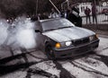 Moldova 25.09.2019. Sport modern Stance E36 BMW Car racing car drifting with smoke drift burnout, Huge clouds with Royalty Free Stock Photo