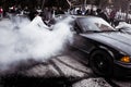 Moldova 25.09.2019. Sport modern Stance E36 BMW Car racing car drifting with smoke drift burnout, Huge clouds with Royalty Free Stock Photo