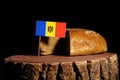 Moldovan flag on a stump with bread
