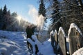 Moldovita, Romania, November 30th, 2018: Children wearing traditional playing with snow in Bucovina