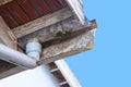 Moldy and Flaking Asbestos Guttering and Downpipe Royalty Free Stock Photo