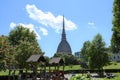 The Mole Antonelliana in Turin seen from a park