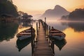 Mole (pier) on the lake. Wooden bridge in forest in spring time with blue lake. Lake for fishing with pier. Royalty Free Stock Photo