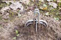 Mole trap sitting on a molehill Royalty Free Stock Photo