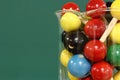 Molecular model: wooden balls in a beaker