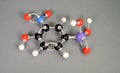 Molecule model of Roxarsone, a disputable ingredient in chicken food. Lilac is Arsen, blue is Ntrogen, black is carbon, Red is Royalty Free Stock Photo