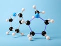 Molecule of nicotine on light blue background. Chemical model