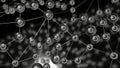 Molecules with lines move in waves. Design. Biological chains of molecular bonds moving in waves. Molecular balls are