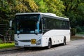 Molenbeek, Brussels Capital Region, Belgium - White Iveco school bus