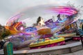 Molln, Germany, November 06, 2021: long exposure of a merry go round on the annual traveling fun fair market before Christmas with Royalty Free Stock Photo
