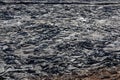 Molten basalt lava texture at Fagradalsfjall volcano lava field created after eruption, Iceland, close-up view Royalty Free Stock Photo