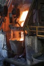 Molten copper is pouring to melting pot. Campfires are about 200 ÃÂ°C short of the temperature needed, so some propose. Royalty Free Stock Photo
