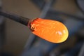 Molten glass on a metal rod for glass blowing macro