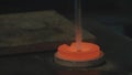 Molten Gold being poured into Ingot moulds. Molten Gold being poured into Ingot moulds. Casting metal or gold being Royalty Free Stock Photo