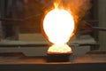 Molten gold pours out of crucible Royalty Free Stock Photo
