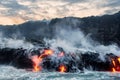 Molten lava flowing into the Pacific Ocean Royalty Free Stock Photo