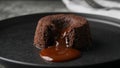 Molten Mound. A Chocolate, Caramel Flow, Illuminated by Subtle Light Source. Royalty Free Stock Photo