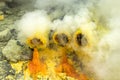 Molten Sulfur Dripping from Pipes at Ijen Volcano, Java, Indonesia