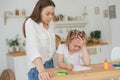 Mom is angry because her daughter dont want to do homework. Parents teaching kids at home, home school education, Mother Royalty Free Stock Photo